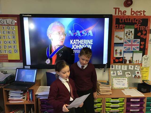 Image of Our maths ambassadors talking about the mathematician of the month ! 